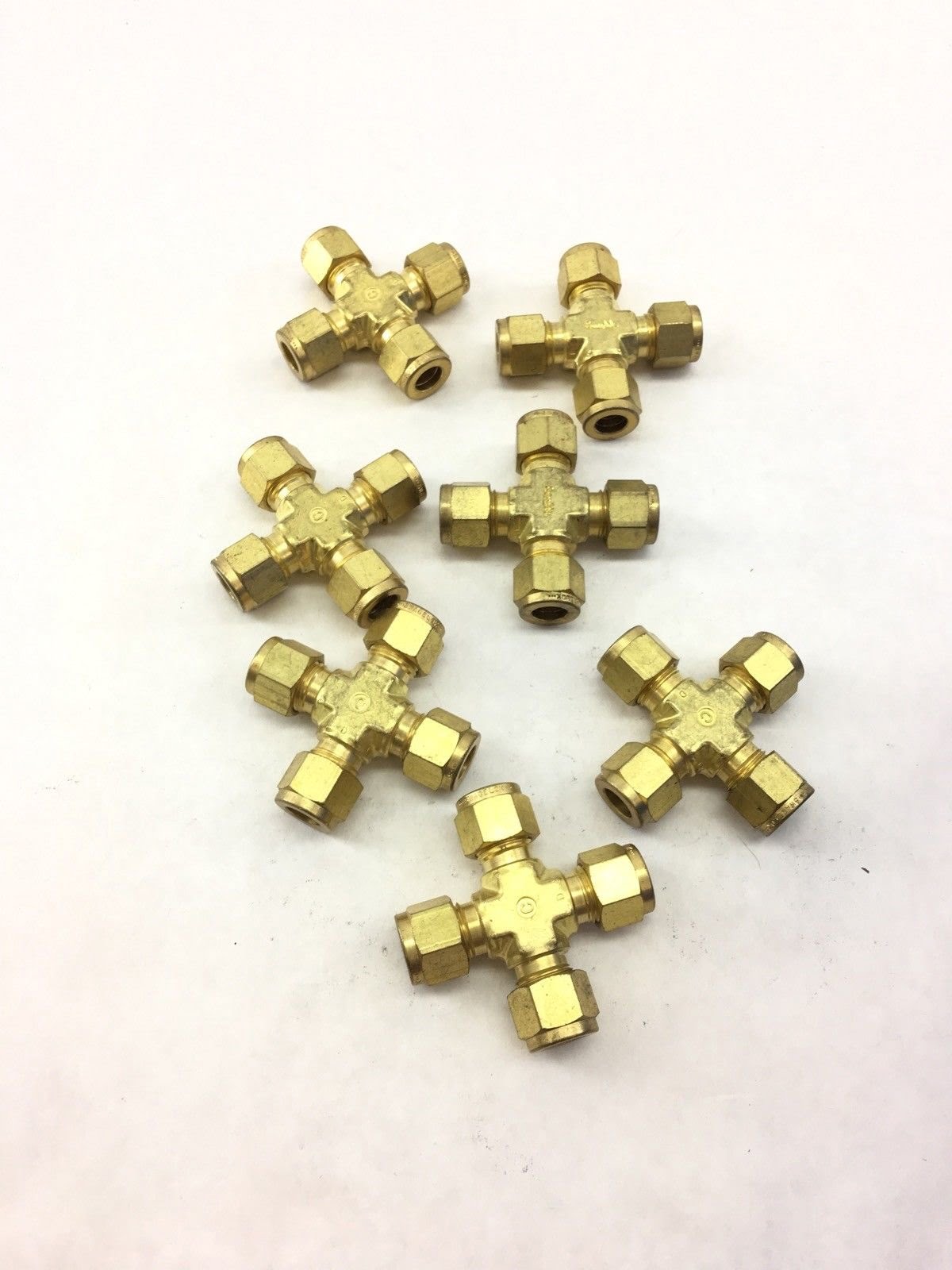 LOT OF 7 SWAGELOK BRASS 3/8 TUBE UNION CROSS CONNECTOR FITTING, (A706)